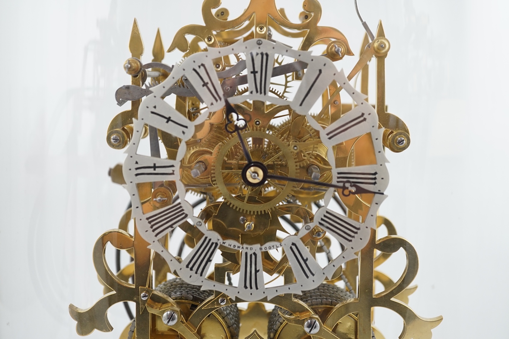 A Victorian brass skeleton clock